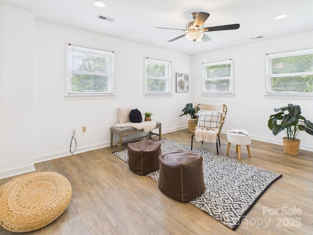 4905 Chestnut Lake Dr, Charlotte, NC 28227 - living area featuring wood finished floors, a ceiling fan, baseboards, and recessed lighting