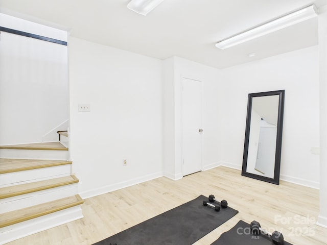 4905 Chestnut Lake Dr, Charlotte, NC 28227 - exercise room featuring wood finished floors and baseboards