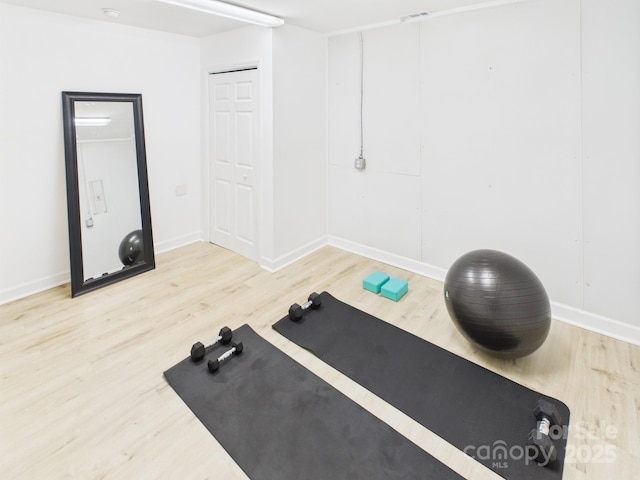 4905 Chestnut Lake Dr, Charlotte, NC 28227 - exercise room featuring wood finished floors and baseboards