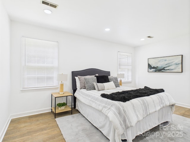 4905 Chestnut Lake Dr, Charlotte, NC 28227 - bedroom with wood finished floors, baseboards, and recessed lighting