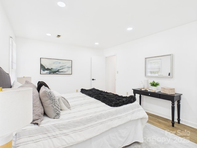 4905 Chestnut Lake Dr, Charlotte, NC 28227 - bedroom with light wood-type flooring and recessed lighting
