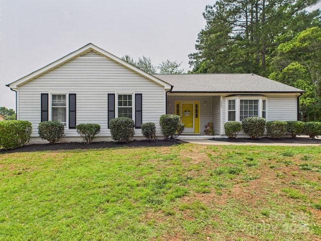 4905 Chestnut Lake Dr, Charlotte, NC 28227 - ranch-style house with a front lawn