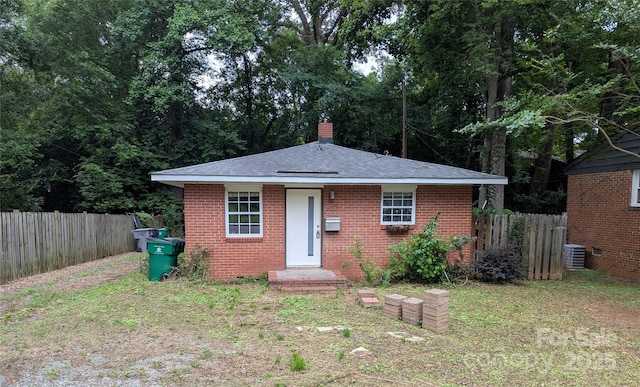 625 Chipley Ave, Charlotte, NC 28205 - bungalow featuring brick siding, a chimney, and roof with shingles
