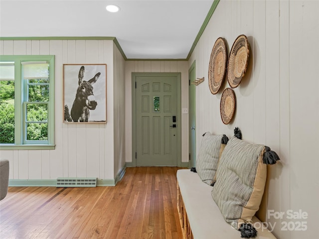 90 W Skyland Cir Unit 1, Asheville, NC 28804 - foyer featuring crown molding, light wood finished floors, baseboards, and wooden walls