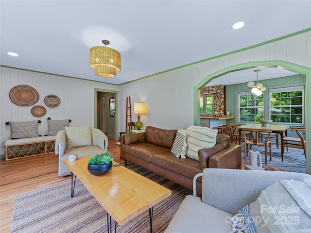 90 W Skyland Cir Unit 1, Asheville, NC 28804 - living room with wood finished floors, arched walkways, recessed lighting, and crown molding