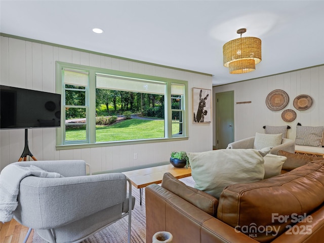 90 W Skyland Cir Unit 1, Asheville, NC 28804 - living room featuring wood finished floors, crown molding, and a decorative wall