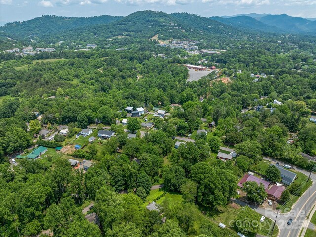 90 W Skyland Cir Unit 1, Asheville, NC 28804 - aerial view of property and surrounding area featuring a mountainous background and a forest