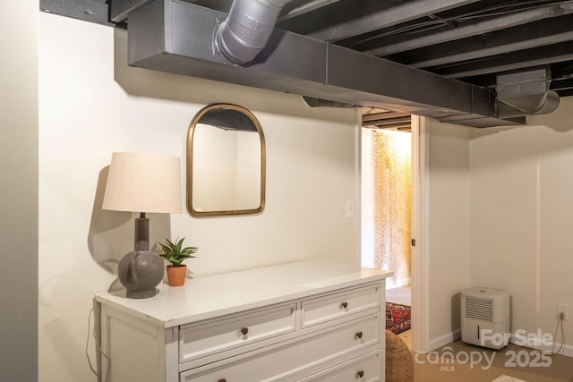 90 W Skyland Cir Unit 1, Asheville, NC 28804 - below grade area featuring baseboards