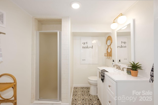 90 W Skyland Cir Unit 1, Asheville, NC 28804 - bathroom with vanity, toilet, a stall shower, tile patterned floors, and baseboards