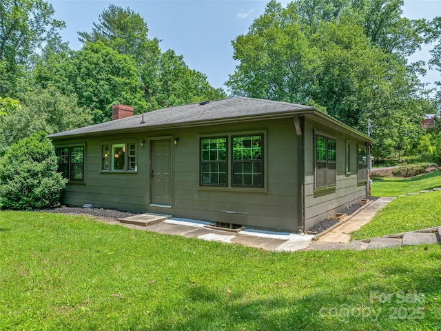 90 W Skyland Cir Unit 1, Asheville, NC 28804 - view of front of property with a front yard and a chimney