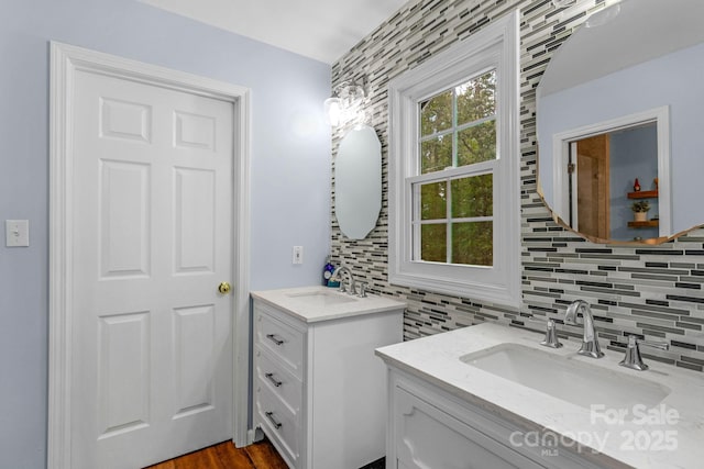 5317 Black Oak Ln Unit 11, Waxhaw, NC 28173 - bathroom featuring two vanities and backsplash