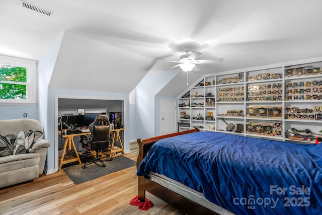 5317 Black Oak Ln Unit 11, Waxhaw, NC 28173 - bedroom featuring wood finished floors, a ceiling fan, lofted ceiling, and a desk
