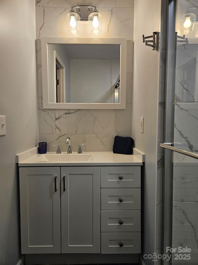 5317 Black Oak Ln Unit 11, Waxhaw, NC 28173 - bathroom featuring vanity and decorative backsplash