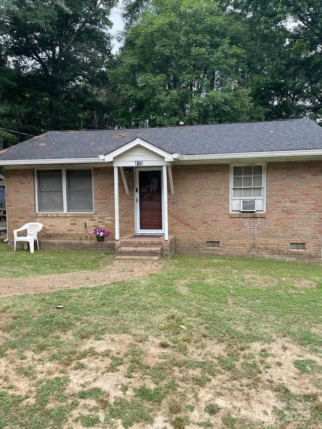 415 N Secrest Ave, Monroe, NC 28110 - ranch-style house featuring crawl space, a front lawn, and brick siding