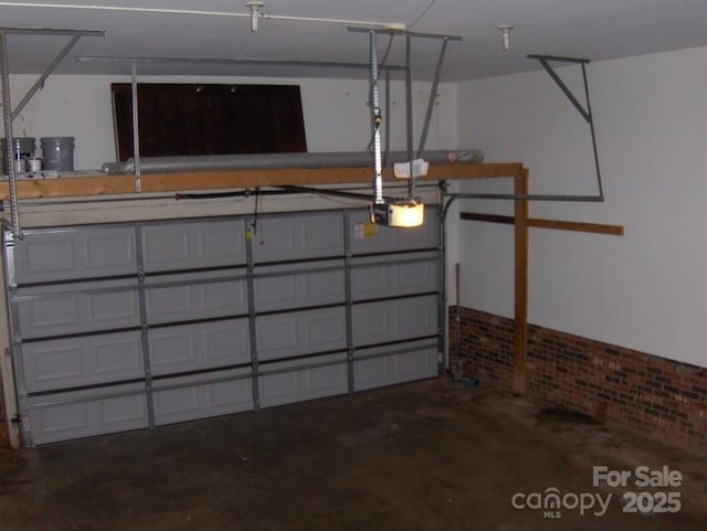 134 Crystal Cir, Mooresville, NC 28117 - garage featuring a garage door opener