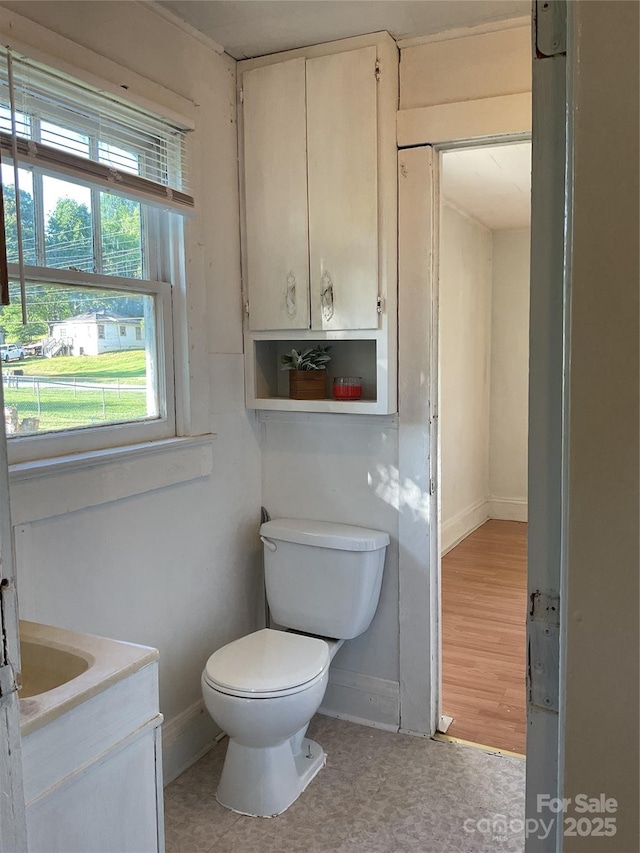 2138 SW Haven Cir, Lenoir, NC 28645 - bathroom with toilet, baseboards, and vanity