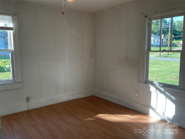 2138 SW Haven Cir, Lenoir, NC 28645 - spare room featuring wood finished floors and baseboards