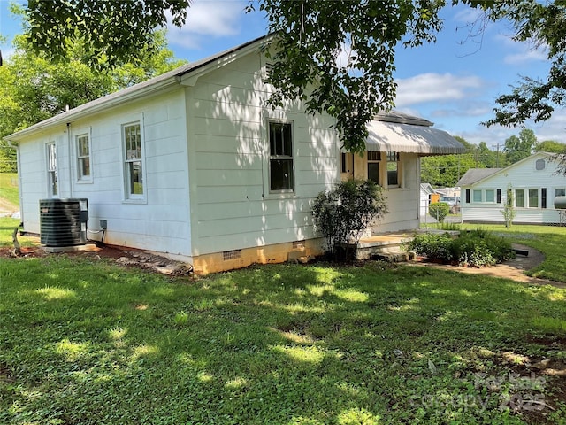 2138 SW Haven Cir, Lenoir, NC 28645 - rear view of property with crawl space, central AC unit, and a yard