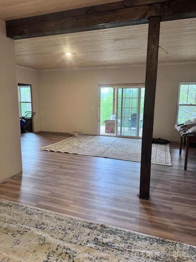 132 Connestee Rd, Brevard, NC 28712 - empty room with healthy amount of natural light, wooden ceiling with exposed beams, crown molding, and wood finished floors
