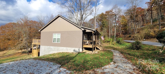 132 Connestee Rd, Brevard, NC 28712 - view of side of home featuring a wooden deck