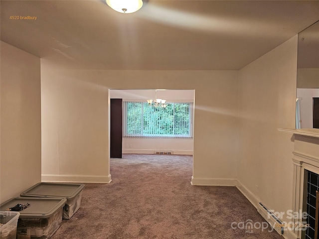 4520 Bradbury Dr, Charlotte, NC 28209 - hallway with a chandelier, carpet flooring, and baseboards