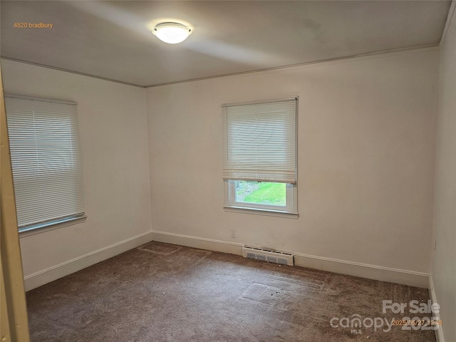 4520 Bradbury Dr, Charlotte, NC 28209 - carpeted empty room featuring baseboards and crown molding