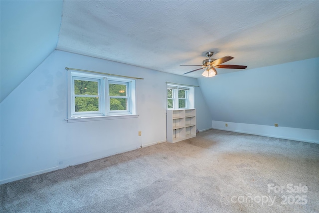 15 Wilson Way, Flat Rock, NC 28731 - bonus room with vaulted ceiling, a ceiling fan, and carpet floors