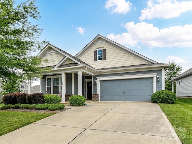 505 Belle Grove Dr, Lake Wylie, SC 29710 - craftsman inspired home with driveway, brick siding, a front lawn, and a porch