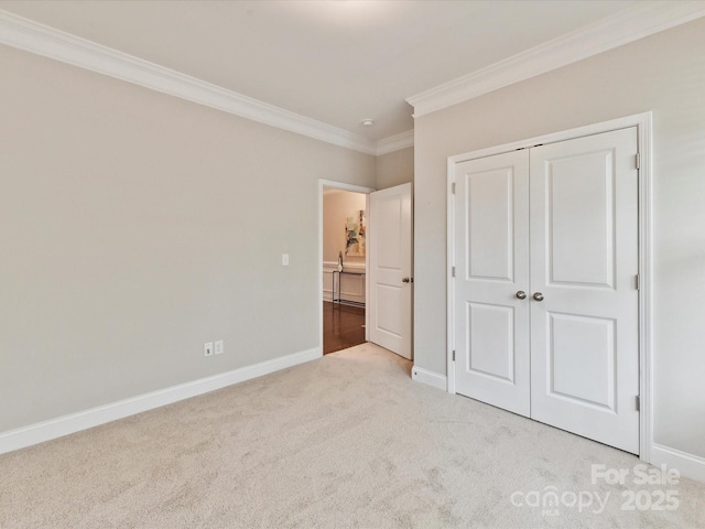 505 Belle Grove Dr, Lake Wylie, SC 29710 - unfurnished bedroom featuring light carpet, ornamental molding, baseboards, and a closet