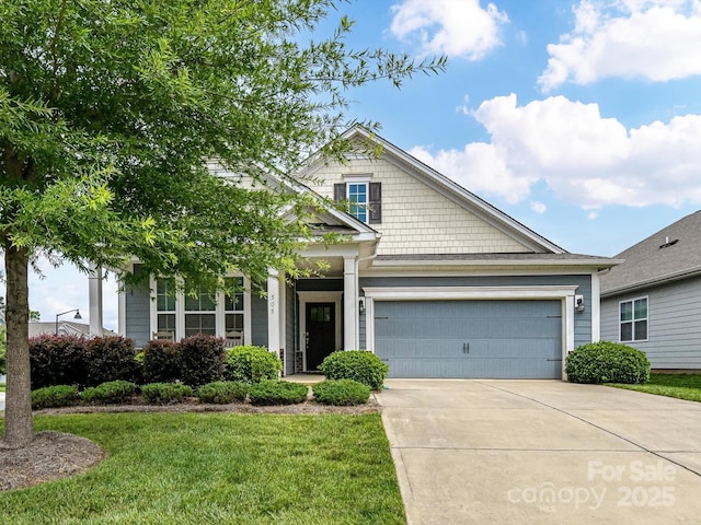 505 Belle Grove Dr, Lake Wylie, SC 29710 - view of front of property featuring concrete driveway, a garage, and a front yard