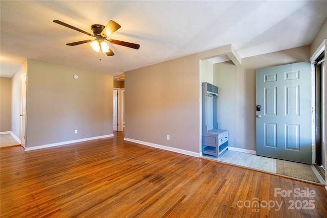 15 Oak Leaf Ln, Arden, NC 28704 - entrance foyer featuring wood finished floors, baseboards, and a ceiling fan