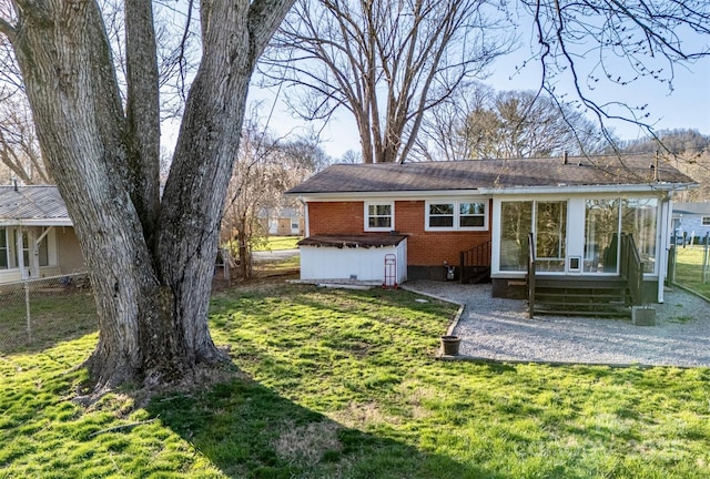15 Oak Leaf Ln, Arden, NC 28704 - rear view of house with entry steps, brick siding, and a yard