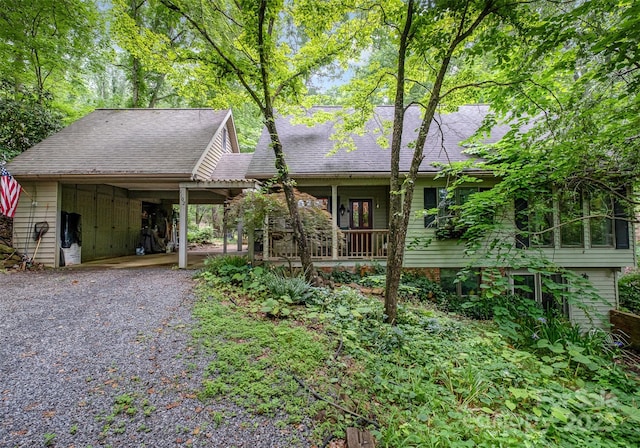 1102 Lake Montonia Rd, Kings Mountain, NC 28086 - view of front of house with driveway, a carport, and covered porch