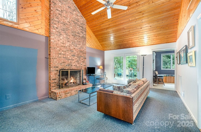 1102 Lake Montonia Rd, Kings Mountain, NC 28086 - carpeted living room with wooden ceiling, a ceiling fan, a fireplace, baseboards, and high vaulted ceiling