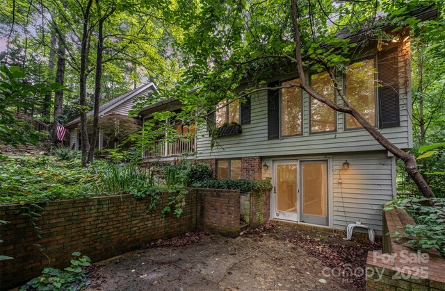 1102 Lake Montonia Rd, Kings Mountain, NC 28086 - rear view of house featuring brick siding