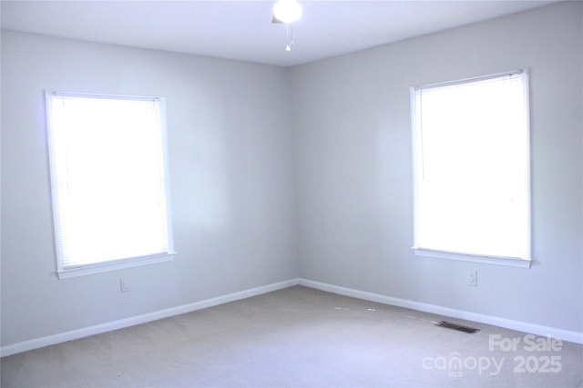 606 E 4th Ave, Gastonia, NC 28054 - unfurnished room featuring carpet flooring and baseboards