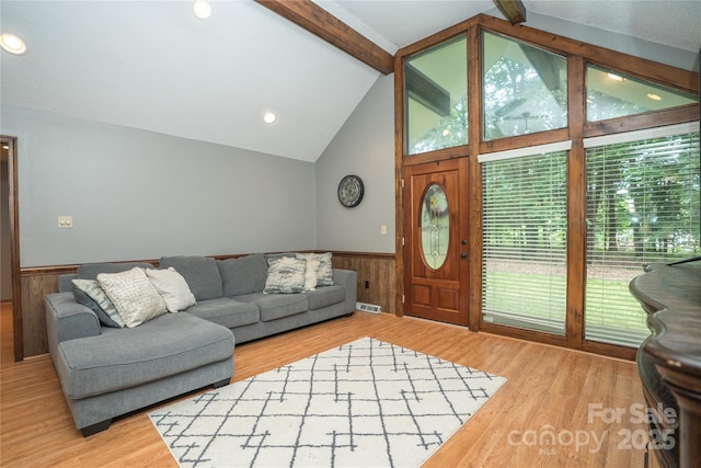 1565 Earnhardt Rd, Salisbury, NC 28146 - living area with a wainscoted wall, light wood-style flooring, and wood walls