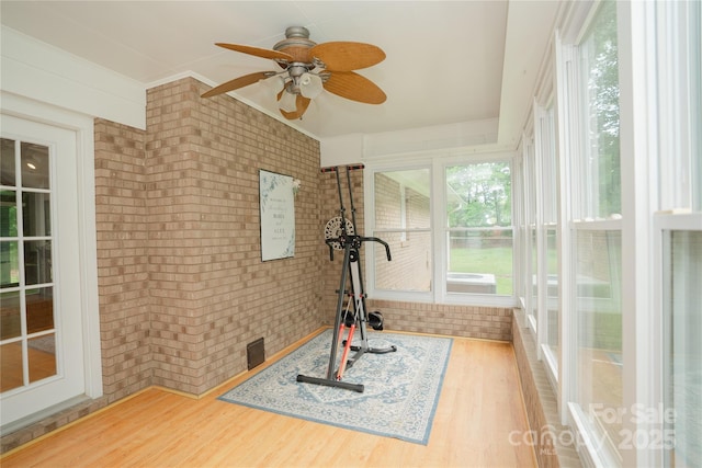 1565 Earnhardt Rd, Salisbury, NC 28146 - workout room featuring brick wall, wood finished floors, and a ceiling fan