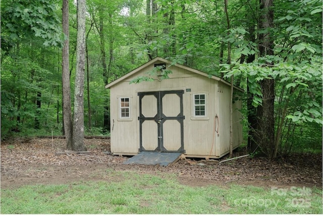 1565 Earnhardt Rd, Salisbury, NC 28146 - view of shed with a wooded view