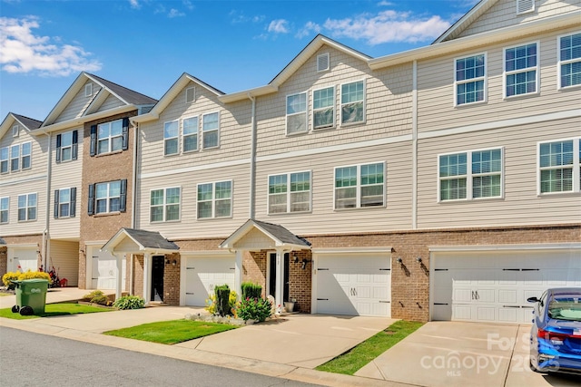 117 Langhorne Dr, Mount Holly, NC 28120 - multi unit property featuring brick siding, driveway, and an attached garage