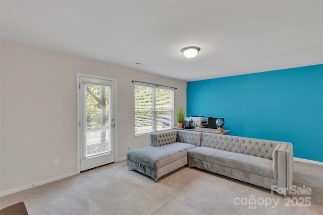 117 Langhorne Dr, Mount Holly, NC 28120 - living area featuring carpet floors and baseboards