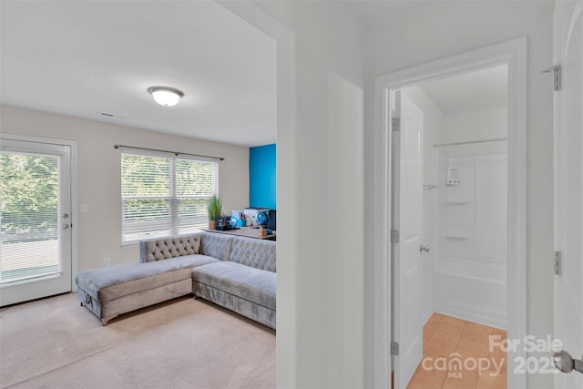 117 Langhorne Dr, Mount Holly, NC 28120 - living area with light tile patterned floors