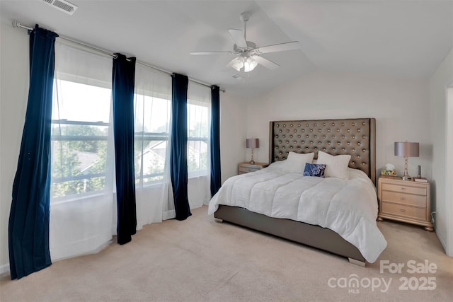 117 Langhorne Dr, Mount Holly, NC 28120 - carpeted bedroom with lofted ceiling and ceiling fan