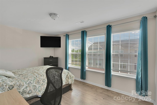 117 Langhorne Dr, Mount Holly, NC 28120 - bedroom featuring light wood-style floors and baseboards