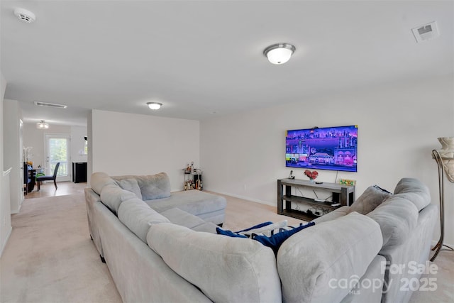 117 Langhorne Dr, Mount Holly, NC 28120 - living area featuring light colored carpet and baseboards