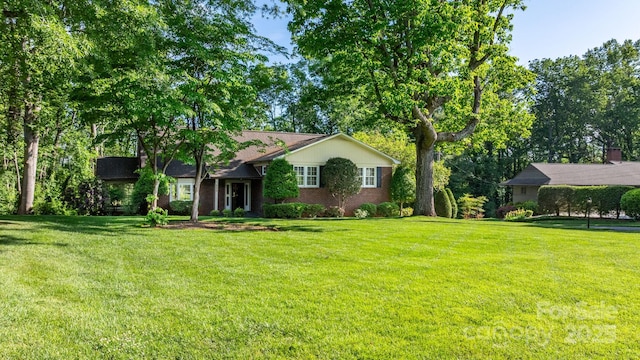 220 W Park Dr, Morganton, NC 28655 - view of front of house with a front yard and brick siding