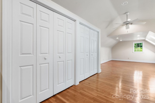 220 W Park Dr, Morganton, NC 28655 - bonus room featuring lofted ceiling, a ceiling fan, light wood-style flooring, and baseboards