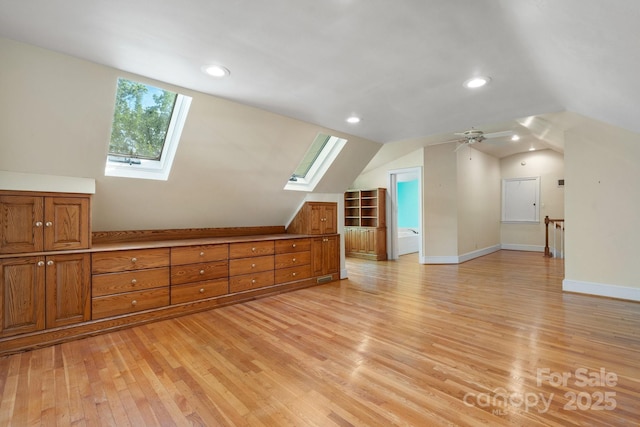 220 W Park Dr, Morganton, NC 28655 - bonus room featuring a skylight, vaulted ceiling, light wood-style floors, recessed lighting, and baseboards