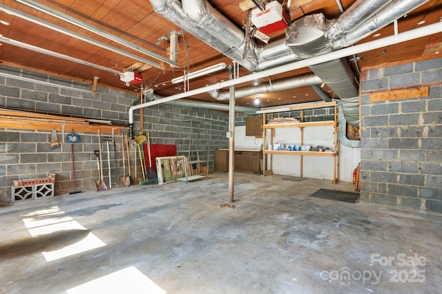 220 W Park Dr, Morganton, NC 28655 - garage featuring concrete block wall and a garage door opener