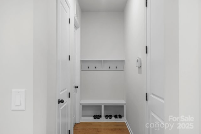 1124 Greenbridge Dr, Matthews, NC 28105 - mudroom featuring wood finished floors and baseboards
